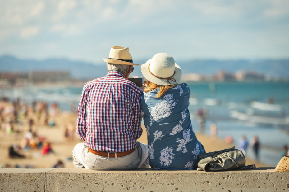 retired couple looking at the ocean