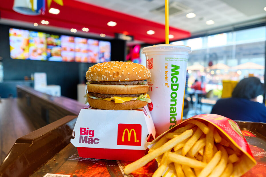A McDonald's Big Mac with french fries on display in a McDonald's fast food restaurant