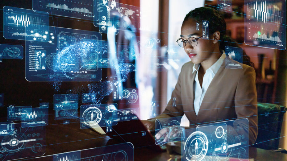 Woman doing computer work, surrounded by digital artificial intelligence signals