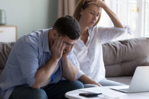 Millennial couple stressed about money
