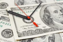 $100 dollar bill with a clock on it, illustrating that time is money.