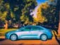 New Toyota Corolla in front of a park