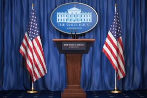 Briefing of president of US United States in White House. Podium speaker tribune with USA flags and sign of White Houise. Politics concept.