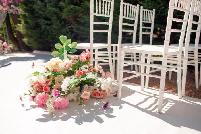 Decorative design of a wedding chair with flowers. High quality photo