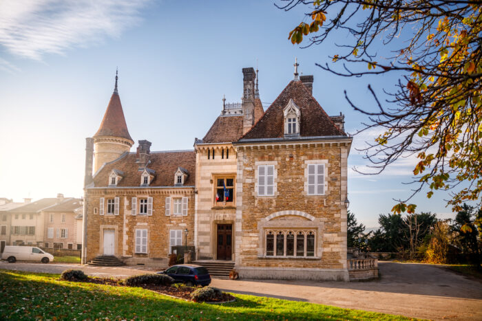 Close-up of public town hall of Ambronay, Blains Castle 16th century. This photo was taken outdoor in the small village of Ambronay near Bugey mountains, in Ain departement, Auvergne-Rhone-Alpes region in France, in Europe, shot during a sunny autumn day.