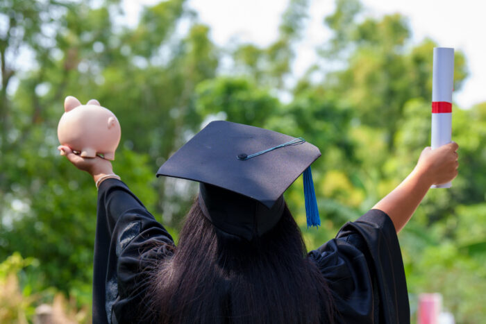 piggy bank With Graduation Cap Money saving concept.