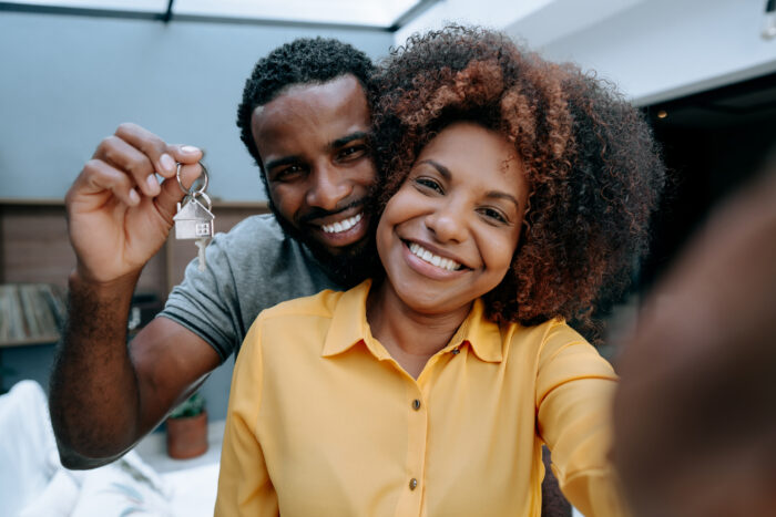 Couple holding keys