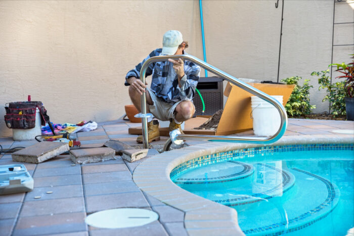 installing a pool handrail