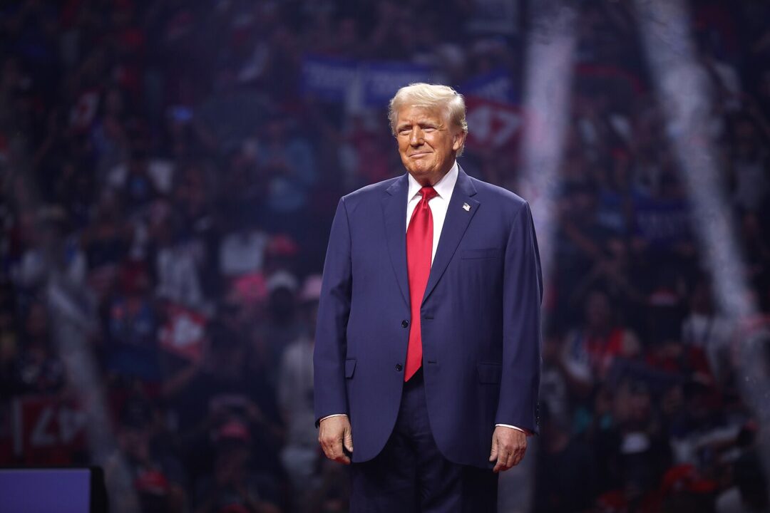 Former President of the United States Donald Trump speaking with attendees at an Arizona for Trump rally at Desert Diamond Arena in Glendale, Arizona.