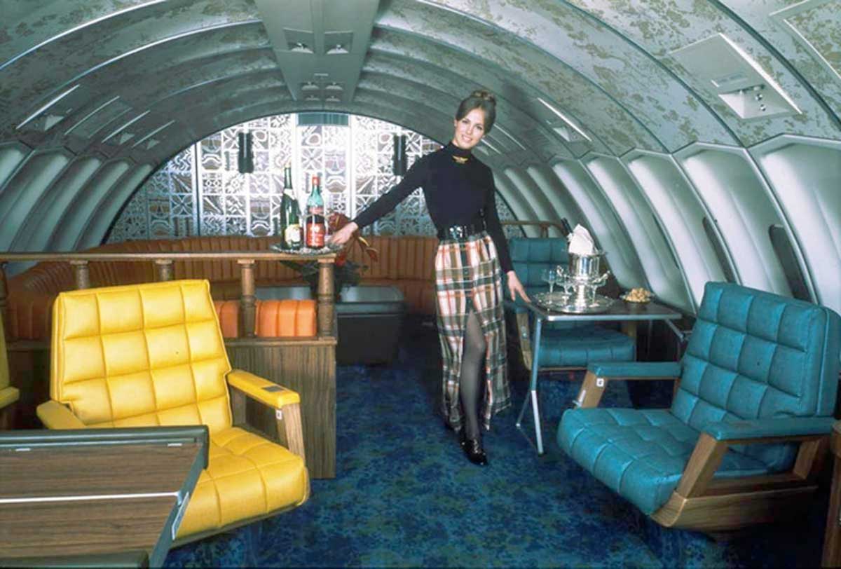 Woman standing in luxury cabin on a flight