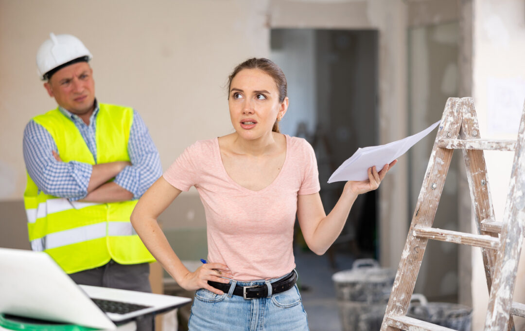 woman looking confused over construction work