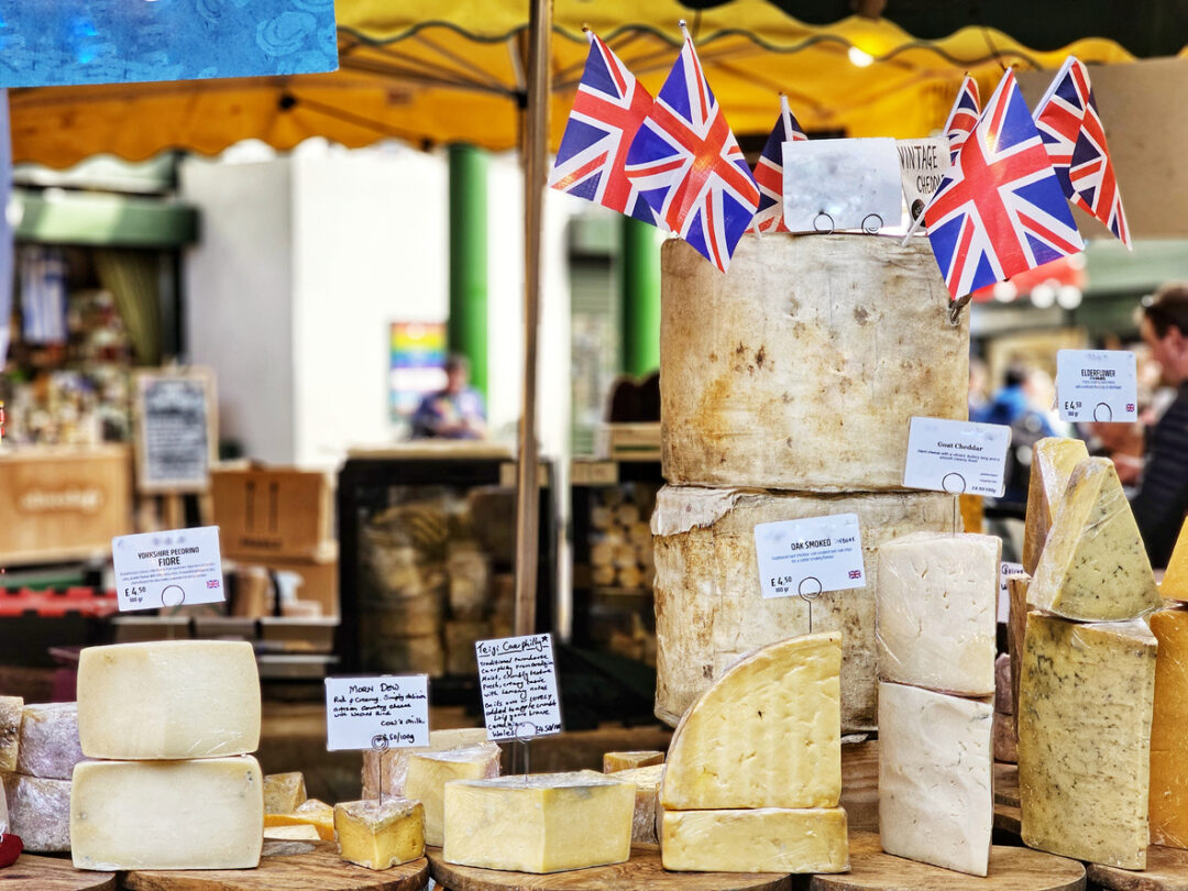 An array of British made cheese on display at Borough Market in London,  UK.