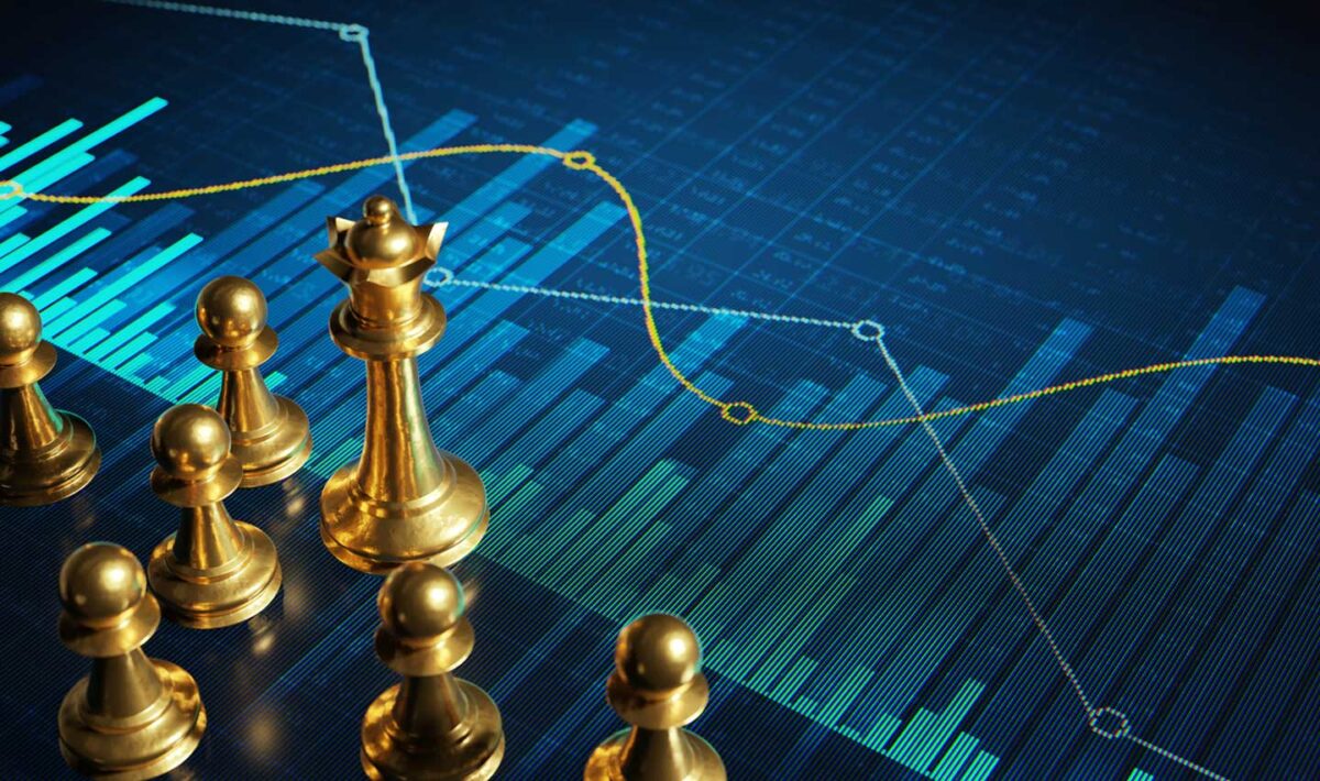 Chess pieces on a screen with graphs