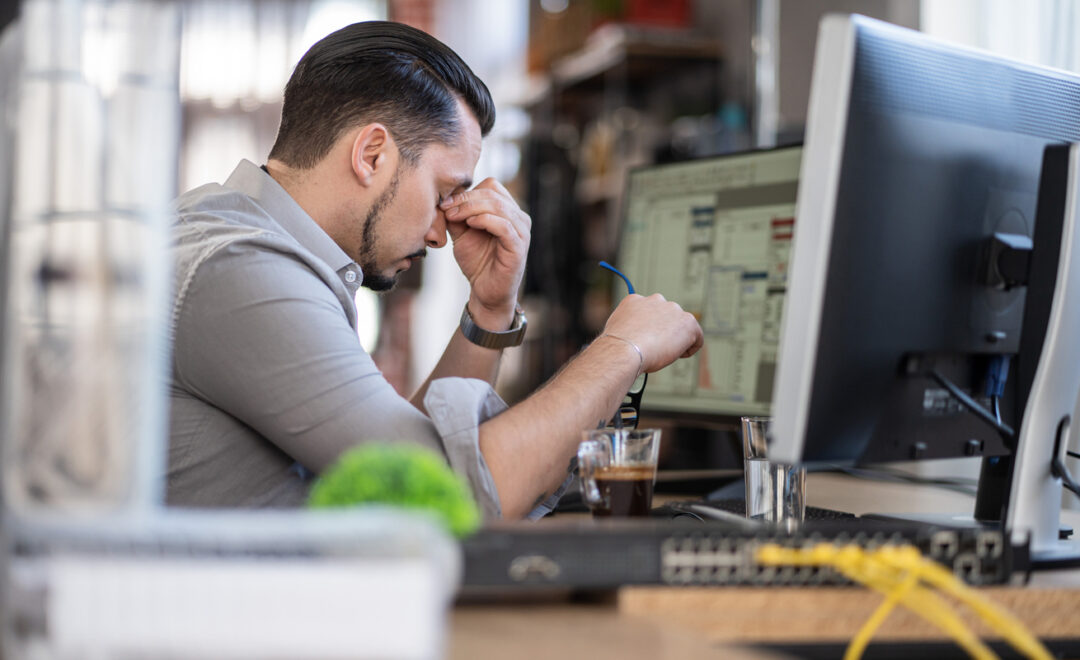 stressed out man at work