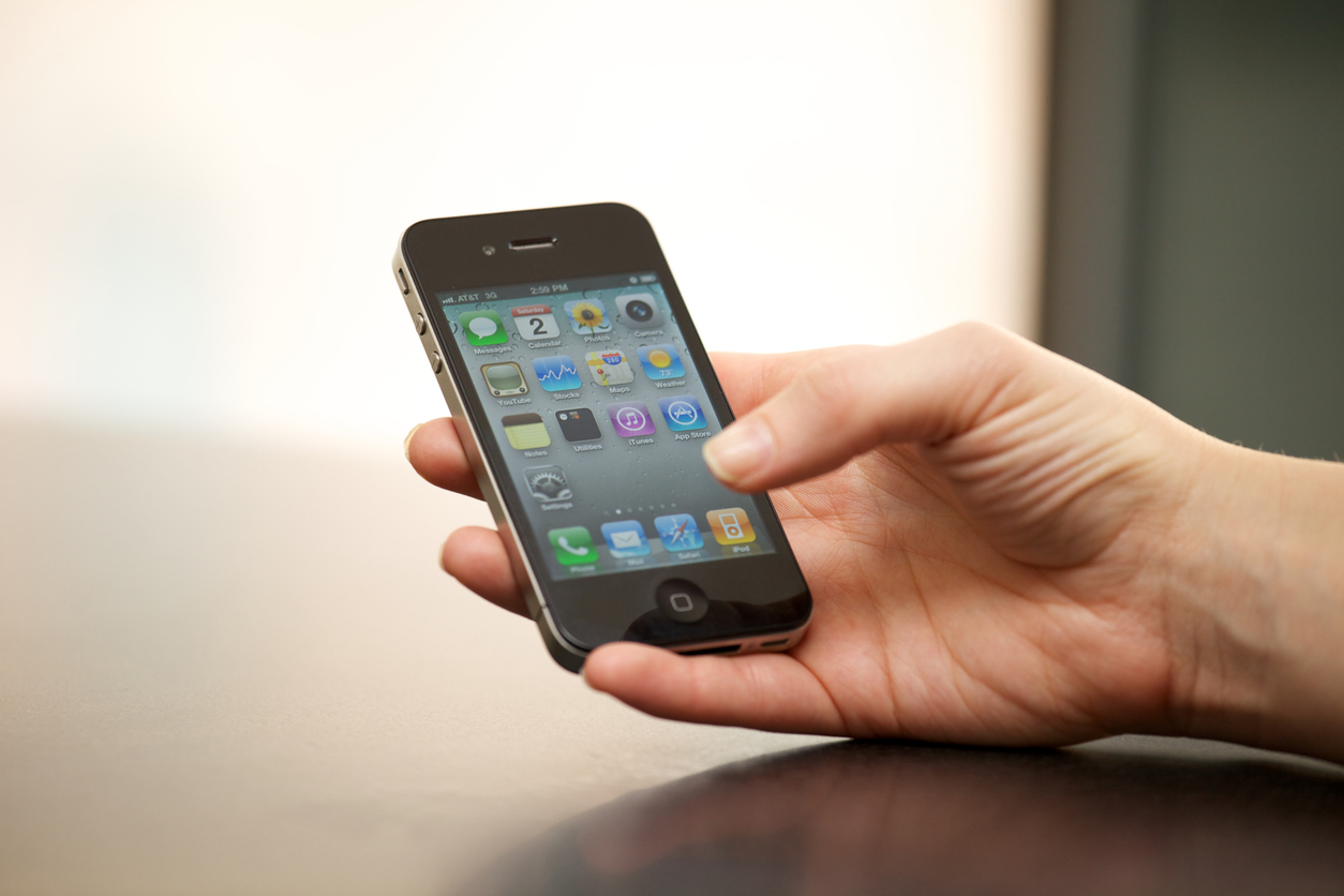 Apple iPhone 4 In a Woman's Hand