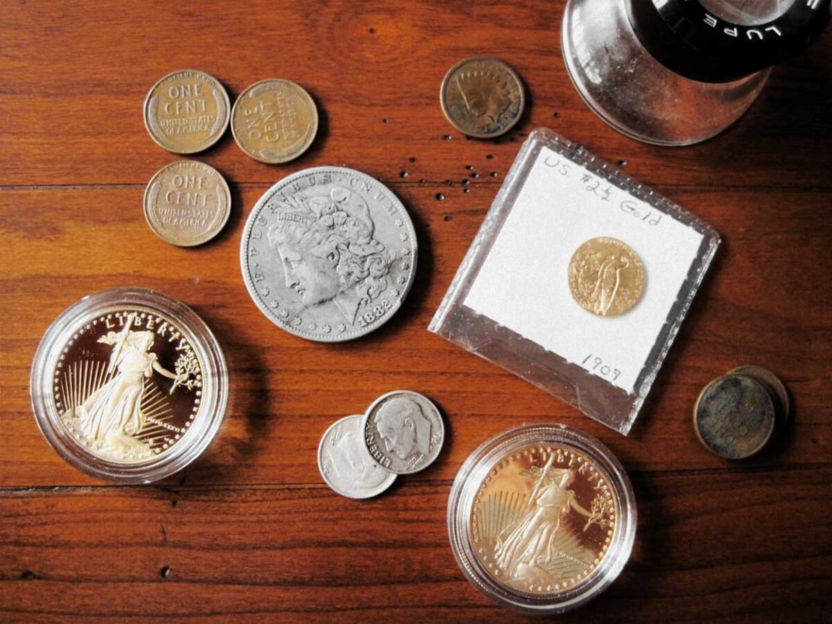 Rare coins on a wooden desk