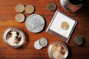 Rare coins on a wooden desk