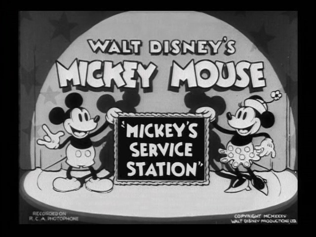 Black and white title screen for "Walt Disney's Mickey Mouse: Mickey's Service Station" featuring Mickey and Minnie Mouse holding a sign with the cartoon's title.