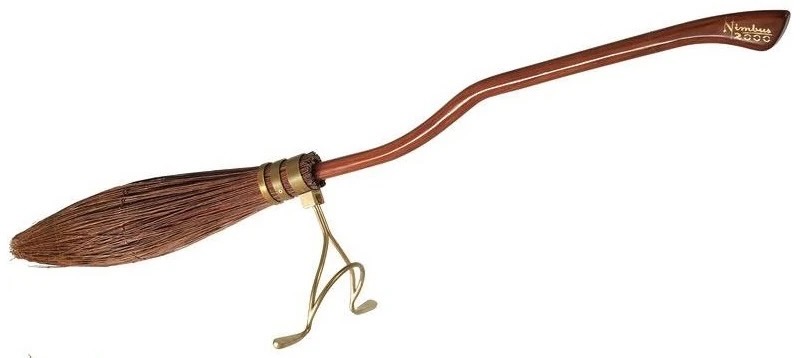 A brown broomstick with a sleek, curved handle and bristles tightly bound by golden bindings. The broom features the word "Nimbus 2000" written on the handle in gold lettering.