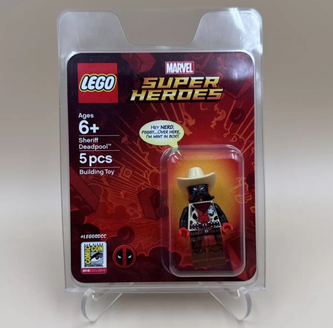 A LEGO Super Heroes set featuring a Sheriff Deadpool minifigure in a red and black outfit with a cowboy hat. The packaging, designed for ages 6 and up, displays the Marvel logo.