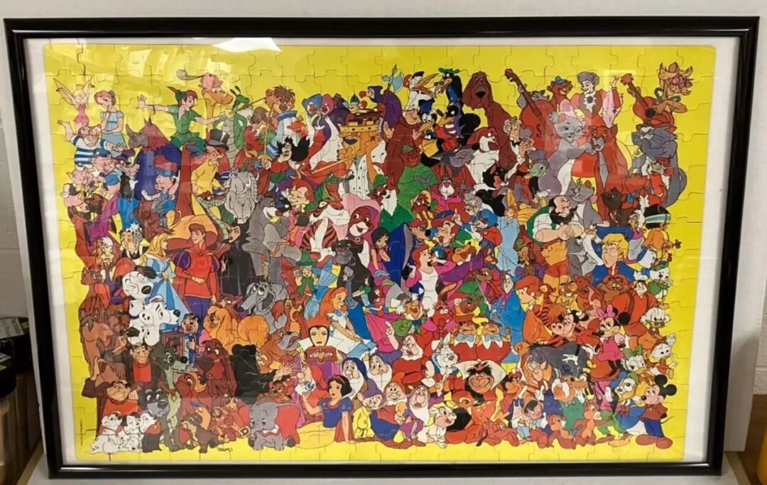 A framed puzzle featuring a colorful collage of cartoon characters on a yellow background. Various animated figures from different movies and shows are depicted, filling the entire image with vibrant colors and diverse characters.