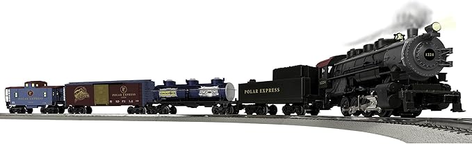 A model Polar Express train set, featuring a black steam locomotive, tender, passenger car, and a caboose, displayed on a track. The train and cars are detailed with logos and text, capturing a classic, festive look.