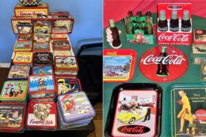 A collection of vintage metal lunchboxes with cartoon and pop culture designs is displayed on the left; on the right are Coca-Cola themed trays, bottles, and memorabilia arranged on a red tablecloth.