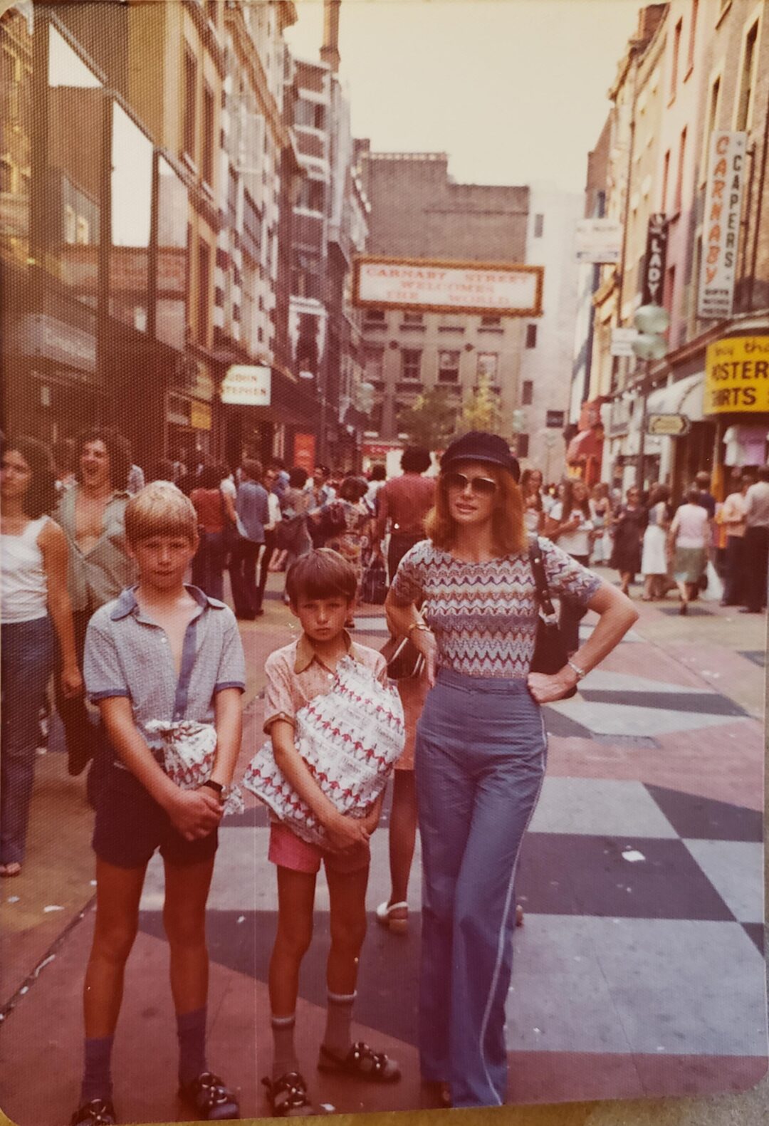family walking on carnaby street in london