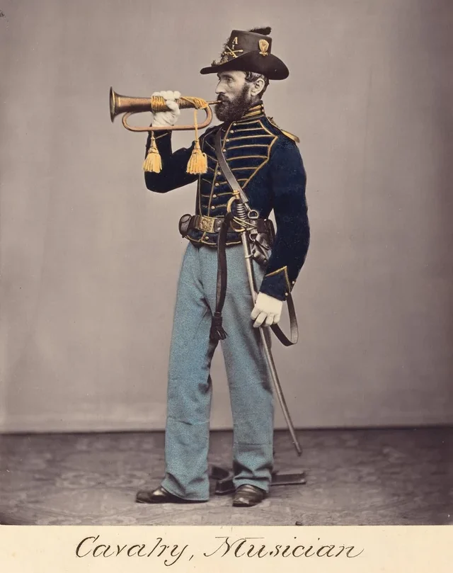 A man in a 19th-century cavalry uniform stands holding a bugle to his lips. He wears a dark jacket with gold trim, light blue pants, a hat with insignia, and has a sword at his side. The text reads "Cavalry Musician.