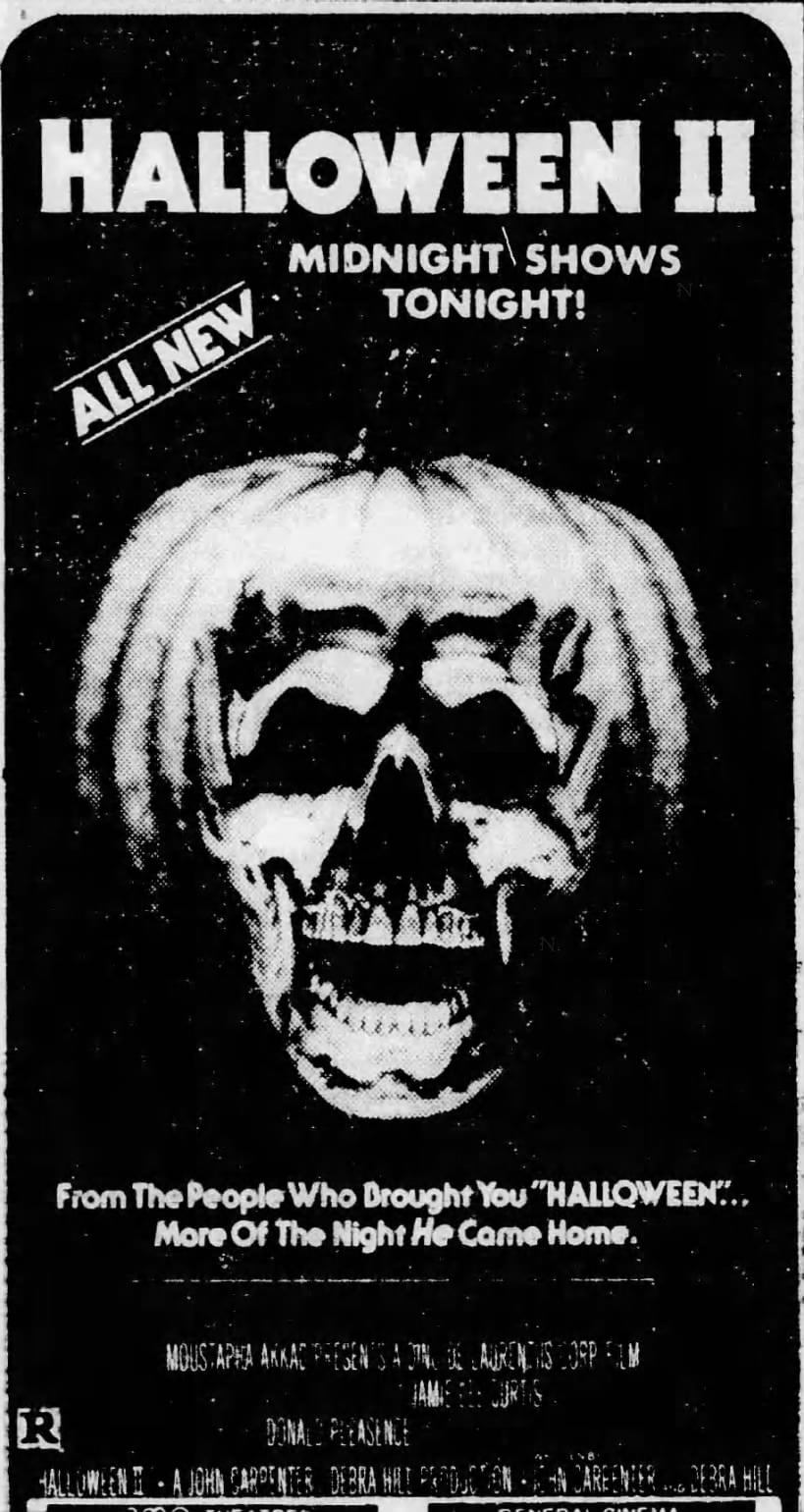 Black-and-white poster for "Halloween II" featuring a glowing jack-o'-lantern with a skull inside, and text promoting midnight shows, the movie's creators, and the phrase "More Of The Night He Came Home.