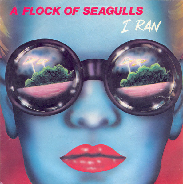 An illustration of a blue-tinted face with red lips and large round sunglasses reflecting a landscape of trees and pink clouds. The text reads "A Flock of Seagulls I Ran" at the top.