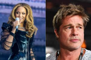 A woman in a shiny black outfit sings into a microphone on stage, while a man in a casual shirt with a lanyard around his neck looks to the side, with both shown in a split-screen format.