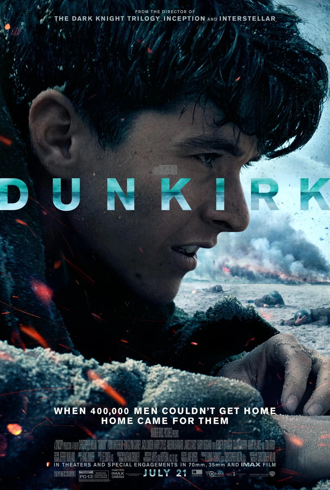 A soldier lies on a beach, looking up tensely, with explosions and debris around him. The large word "DUNKIRK" is overlaid, with credits and a release date of July 21 at the bottom.