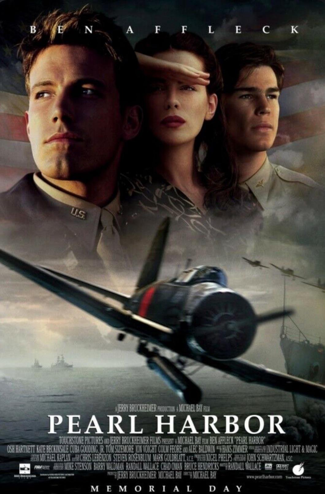 Movie poster for "Pearl Harbor" showing three people in military attire above a flying fighter plane, with an American flag in the background and the film title at the bottom.