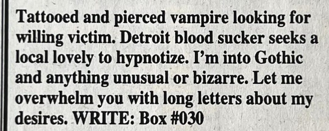 A black-and-white newspaper personal ad reads: "Tattooed and pierced vampire looking for willing victim. Detroit blood sucker seeks a local lovely to hypnotize..." with more about Gothic interests and writing long letters.