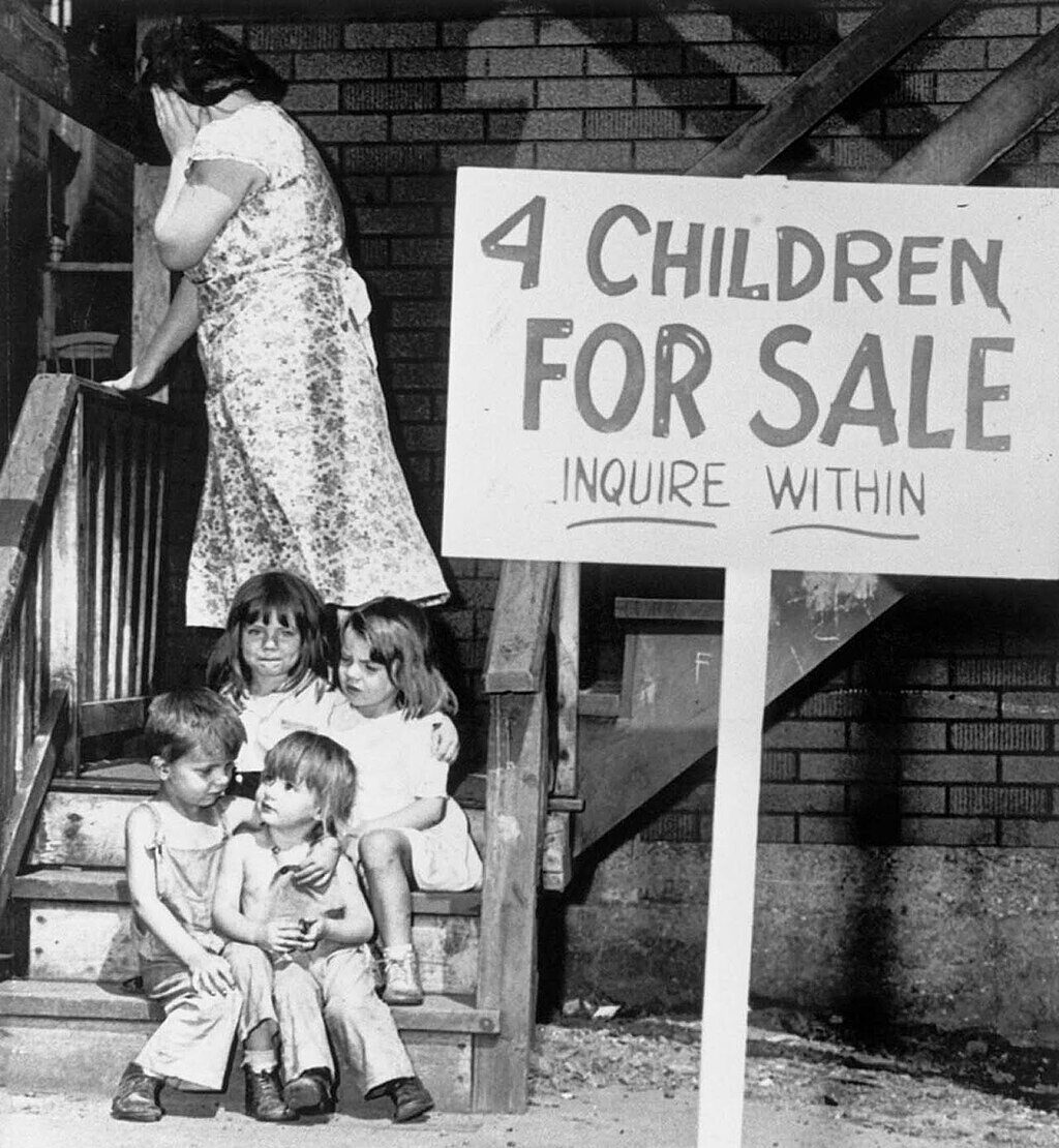 A black-and-white photo shows four young children sitting on stairs beside a sign that reads "4 Children For Sale Inquire Within." A woman stands behind them, partially covering her face.