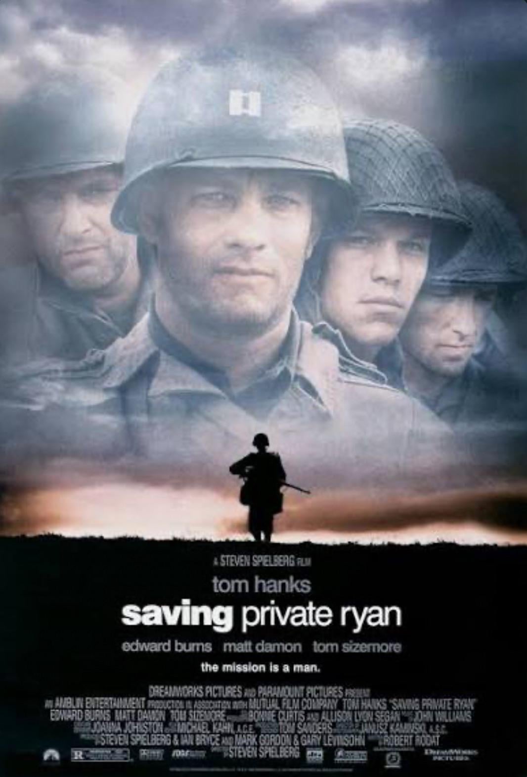 Movie poster for "Saving Private Ryan" showing four soldiers in uniform, with one in front. Below, a silhouette of a soldier walks across a smoky battlefield. Movie title and cast names are displayed in bold letters.