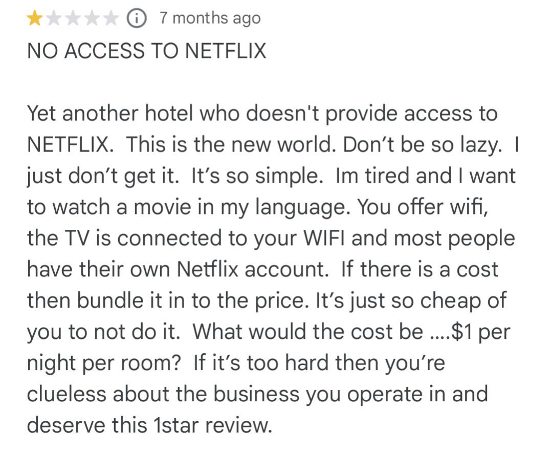 A one-star hotel review complaining about no Netflix access. The reviewer criticizes the lack of streaming, says it should be simple and included, calls the business clueless, and suggests bundling it in the price.