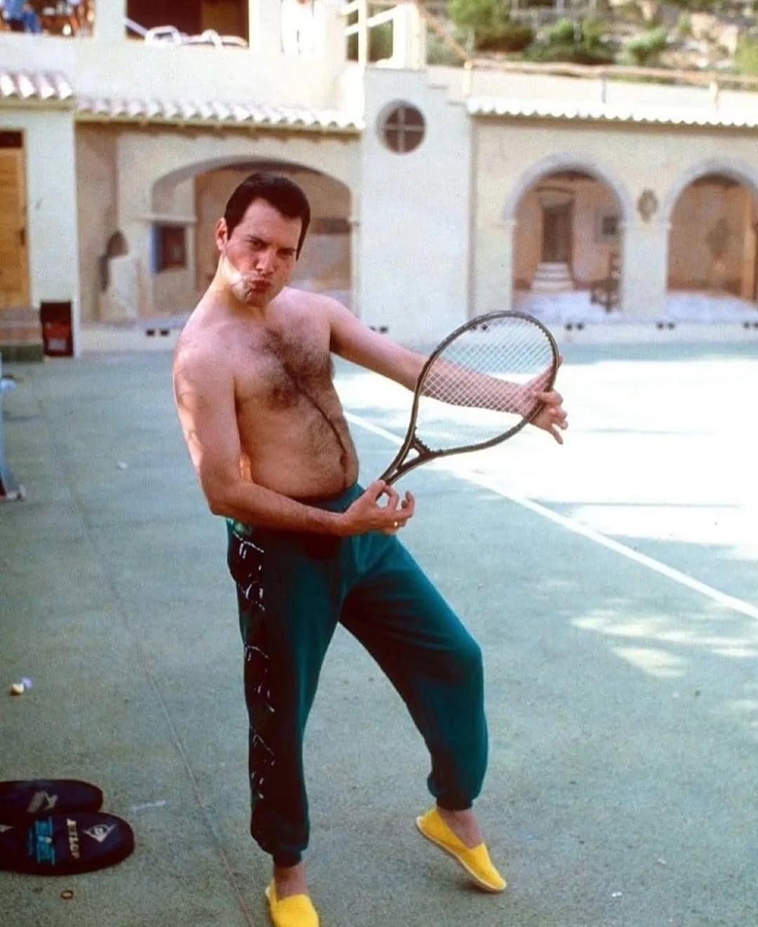 A man holding a tennis racket