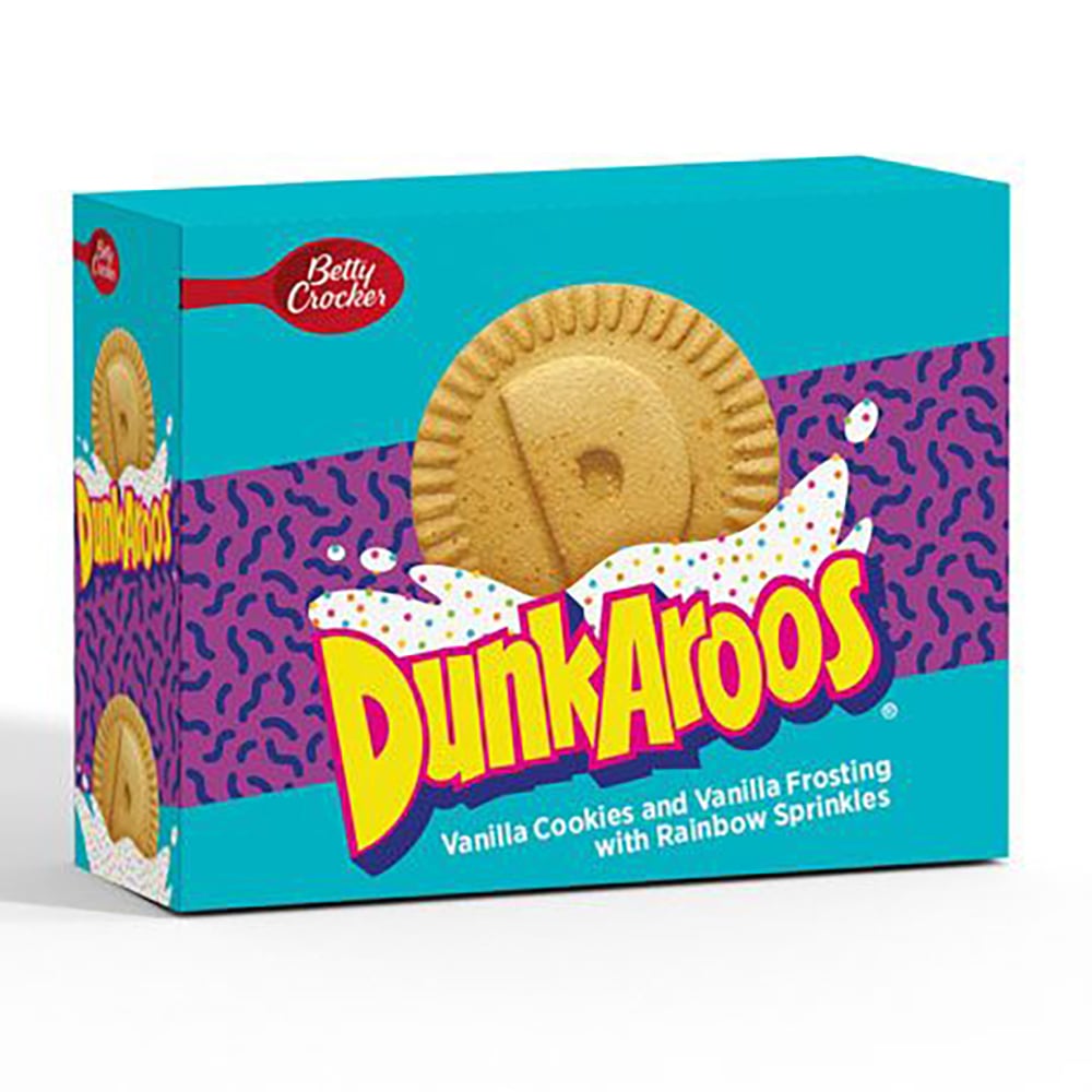 A blue and purple box of Betty Crocker DunkAroos featuring an image of a vanilla cookie. The packaging reads "DunkAroos: Vanilla Cookies and Vanilla Frosting with Rainbow Sprinkles.