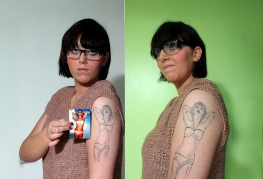 A woman with dark hair and glasses shows her arm tattoo of a bikini-clad woman; the tattoo is poorly drawn compared to the photo she holds. In the second image, she stands against a green wall, looking somewhat disappointed.