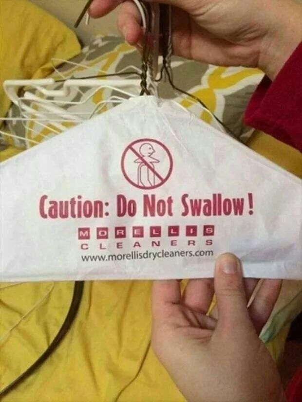 A person holds a paper cover on a clothes hanger that reads “Caution: Do Not Swallow!” above the Morelli's Cleaners logo and website. A graphic shows a person with a hanger crossed out.