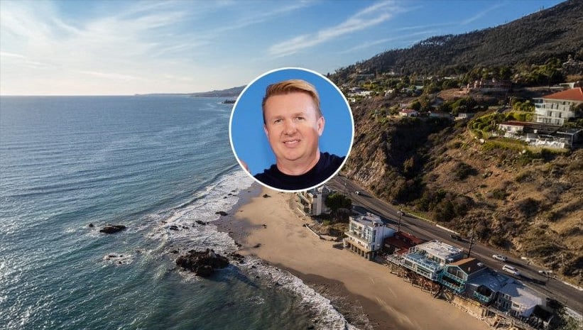 A coastal scene with beach houses along a shoreline and hills in the background, overlaid with a circular portrait of a smiling man with short red hair against a blue background.