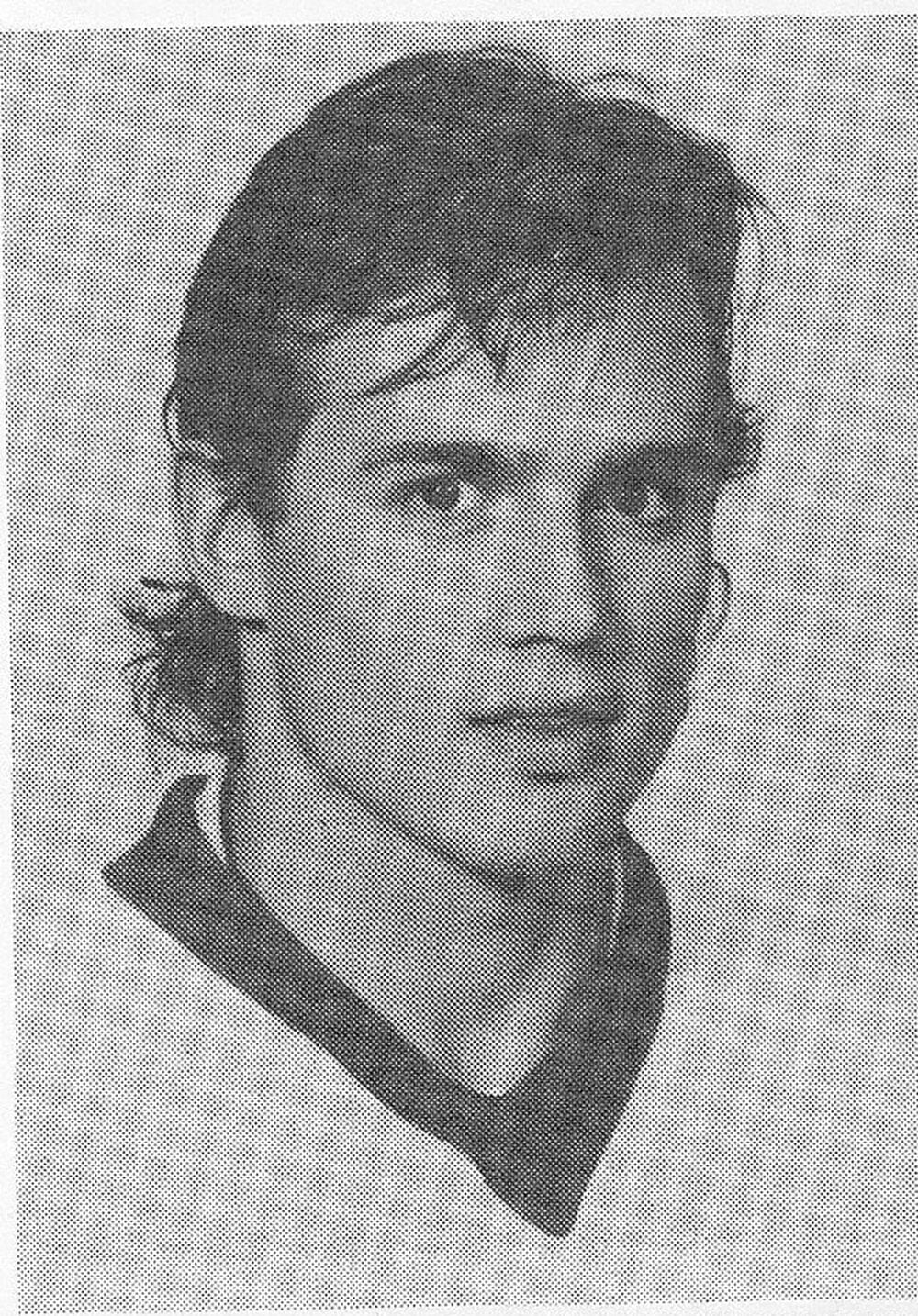 Black-and-white headshot of a young man with short, slightly tousled hair, wearing a sports jersey. The caption below the image reads, "Steve Yzerman.