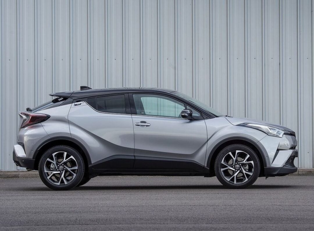 A car parked in front of a building
