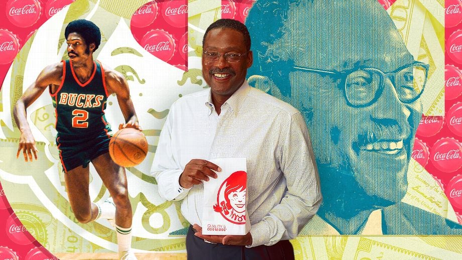 A smiling man in a white shirt holds a Wendy’s bag; behind him are a large portrait of an older man, a basketball player in a Bucks uniform, and a background with Coca-Cola logos and red and yellow patterns.