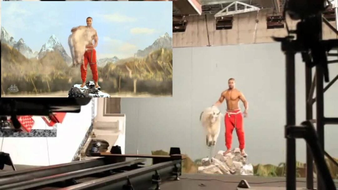 A man in red pants stands on rocks holding a fur, posing in front of a painted backdrop of mountains on a film set. The image includes a smaller inset showing the completed scene with added background effects.