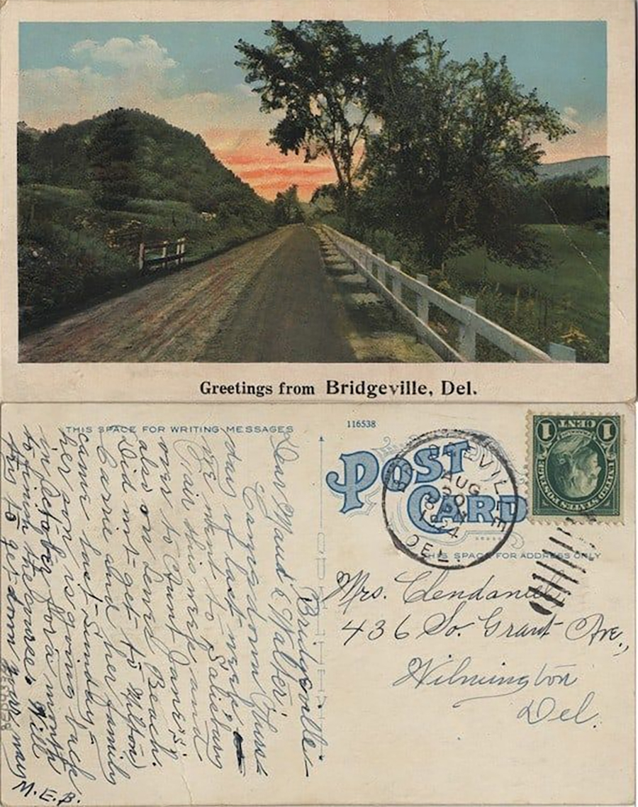 A vintage postcard from Bridgeville, Delaware, showing a scenic road with trees at sunset on top, and handwritten message, address, and postage stamp on the bottom half.