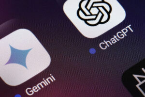 Close-up of a smartphone screen showing the Gemini app icon with a blue star-like logo and the ChatGPT app icon with a black-and-white geometric logo, both with notification dots.