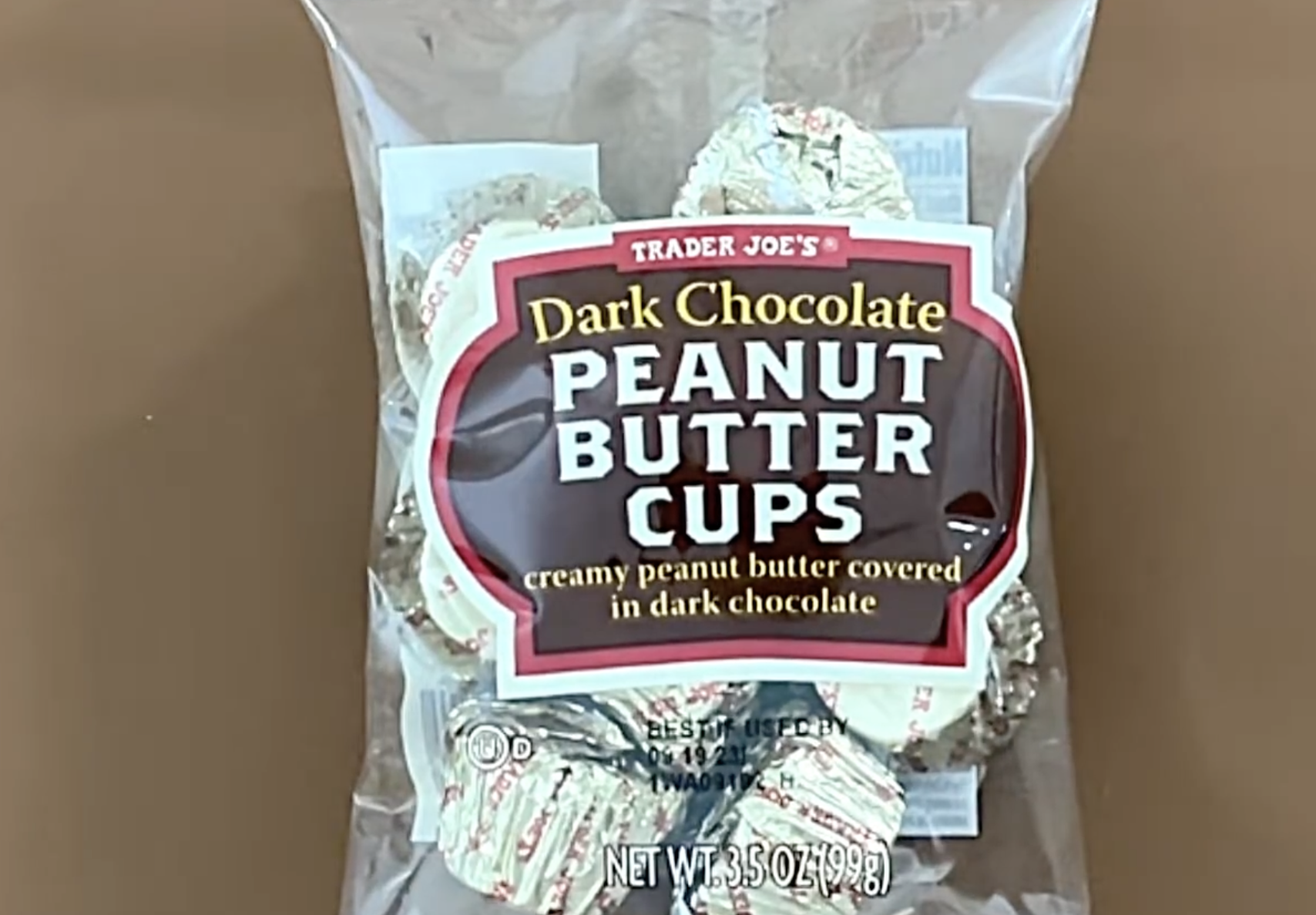 A clear plastic bag of Trader Joe’s Dark Chocolate Peanut Butter Cups.